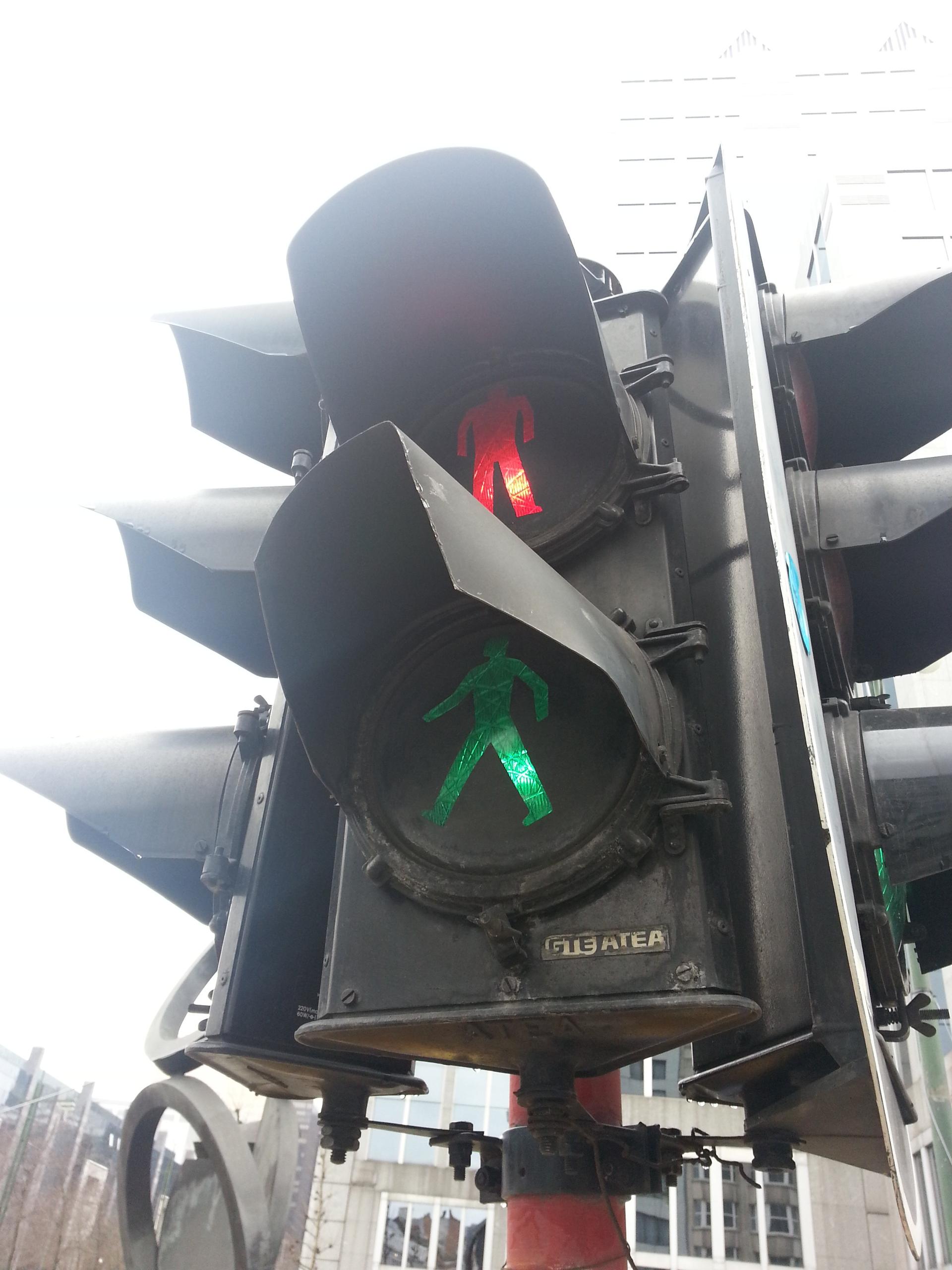 Traffic lights shining both red and green
